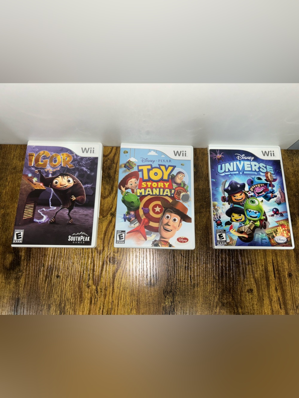 Lot #5 - Nintendo Wii Disney Bundle (Toy Story, Igor, Disney Universe)